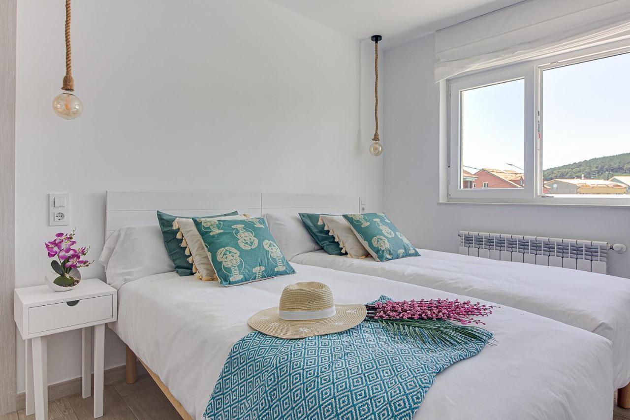 Apartamentos Playa De Finisterre Exteriör bild