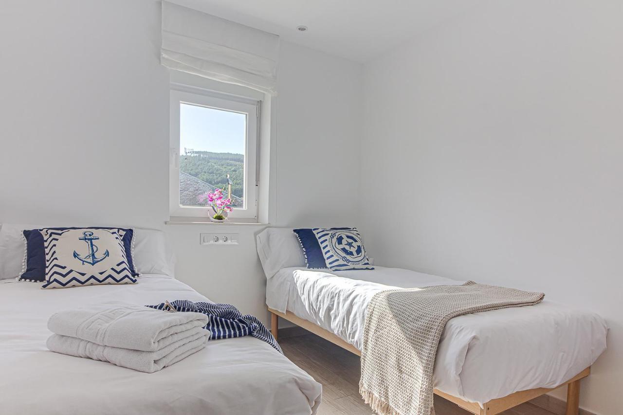 Apartamentos Playa De Finisterre Exteriör bild