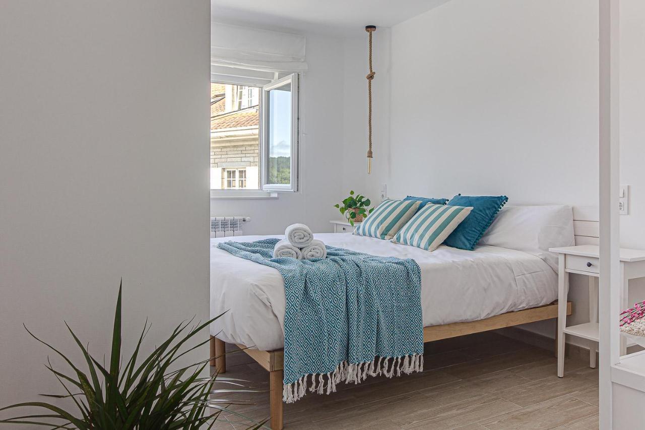 Apartamentos Playa De Finisterre Exteriör bild